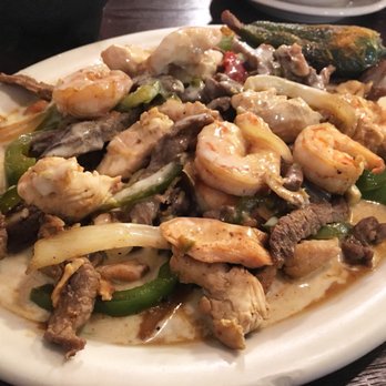 Pancho Villas - The dinner Especial de la Cocina minus the rice. With steak, chicken, shrimp, onion, green pepper and cheese sauce. - Mexican Near Me - High Point, North Carolina Pancho Villas - The dinner Especial de la Cocina minus the rice. With steak, chicken, shrimp, onion, green pepper and cheese sauce. - Mexican Near Me - High Point, North Carolina