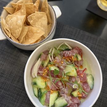 Pacific Coast Fish - AGUACHILE CEVICHE- FISH, CUCUMBER, SHALLOTS, CRISPY GARLIC, CHILI PEPPER, CILANTRO & TOBIKO IN A CITRUS-CHILI SAUCE W/FRESH TORTILLA CHIPS. - Seafood Near Me - Seal Beach, California Pacific Coast Fish - AGUACHILE CEVICHE- FISH, CUCUMBER, SHALLOTS, CRISPY GARLIC, CHILI PEPPER, CILANTRO & TOBIKO IN A CITRUS-CHILI SAUCE W/FRESH TORTILLA CHIPS. - Seafood Near Me - Seal Beach, California