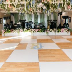 Design Perfection - The ballroom/dancefloor Ceiling covered with greenery and flowers