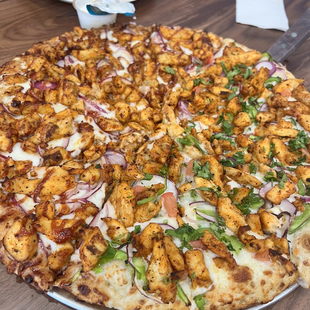 Curry Pizza House Manteca - Large size pizza Left: desi bbq Right: tabdoori - Pizza Near Me - Manteca, California