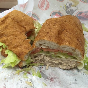 Jersey Mike's Subs - Tuna Sandwich - Mike's Way (half eaten) - Fast Food Near Me - East Brunswick, New Jersey Jersey Mike's Subs - Tuna Sandwich - Mike's Way (half eaten) - Fast Food Near Me - East Brunswick, New Jersey