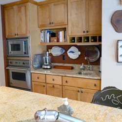 Kitchen design focusing on a collection of fish accessories.