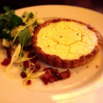 Underwood Bar and Bistro - Warm goat cheese tart with Caramelized onions, pancetta and watercress salad - Lounges Near Me - Graton, California Underwood Bar and Bistro - Warm goat cheese tart with Caramelized onions, pancetta and watercress salad - Lounges Near Me - Graton, California