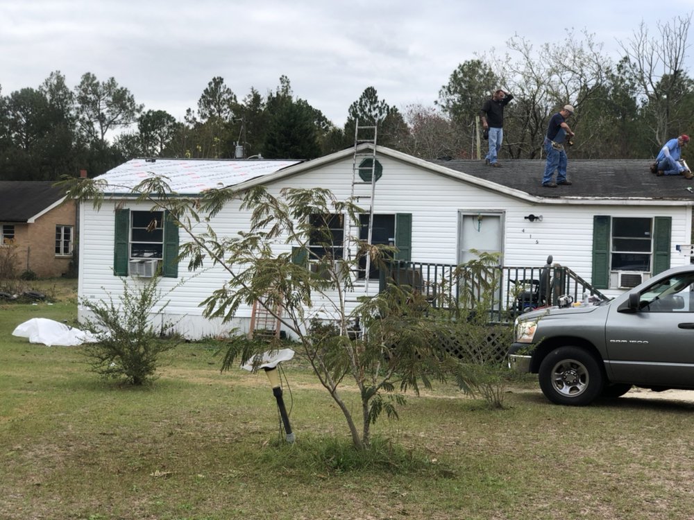 Slide of Butler Roofing