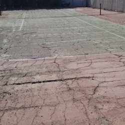 Great West Asphalt - Our old tennis court locked up for over 25 years