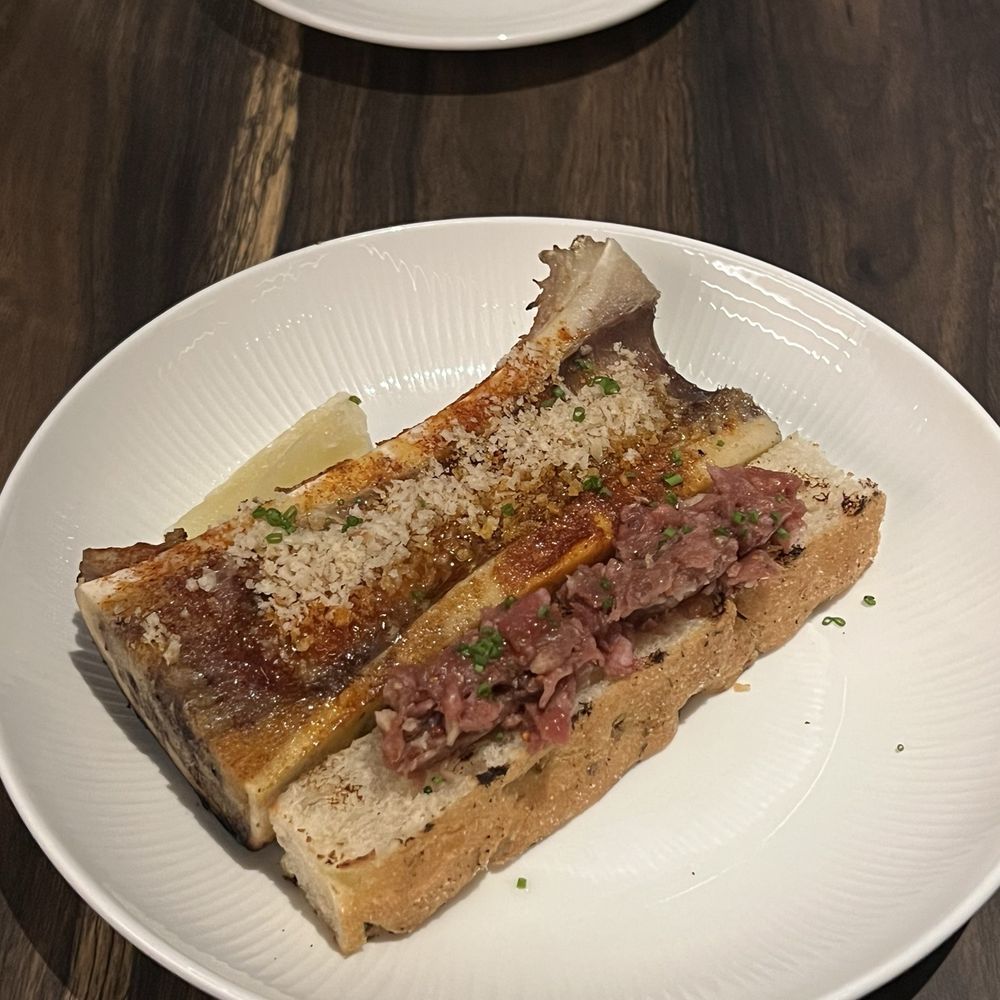Hestia Kitchen + Bar - Bone Marrow + wagyu Tartare beef marrow + brant lake wagyu + focaccia - Steakhouses Near Me - Richmond, British Columbia Hestia Kitchen + Bar - Bone Marrow + wagyu Tartare beef marrow + brant lake wagyu + focaccia - Steakhouses Near Me - Richmond, British Columbia