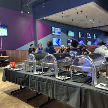Dave & Buster's Livonia - Eating section with chafing dishes!. We had fries, pretzels, pigs in a blanket, chicken nuggets, pizza and a variety of drinks! - Sports Bars Near Me - Livonia, Michigan Dave & Buster's Livonia - Eating section with chafing dishes!. We had fries, pretzels, pigs in a blanket, chicken nuggets, pizza and a variety of drinks! - Sports Bars Near Me - Livonia, Michigan