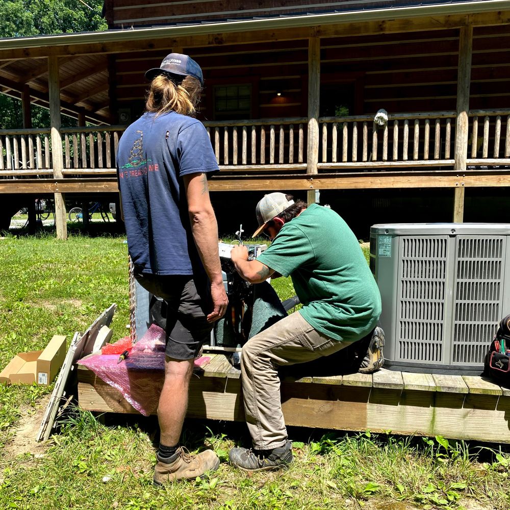 Air Nerds Cooling and Heating  - Air Nerds hard at work. They're not really nerds, they are pretty cool guys. - Heating & Air Conditioning/HVAC Near Me - Louisa, Virginia