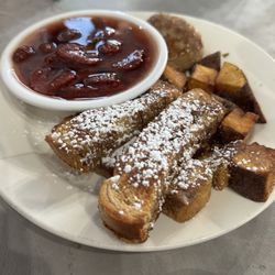Kids French toast sticks, sausage, breakfast potato's and berry compote