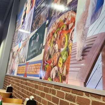 Ethan's Pizza - a little boy sitting at a table - Pizza Near Me - Paramus, New Jersey