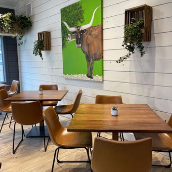 Dos Olivos Market - Extra seating in a small room of the side - Specialty Food Near Me - Wimberley, Texas Dos Olivos Market - Extra seating in a small room of the side - Specialty Food Near Me - Wimberley, Texas