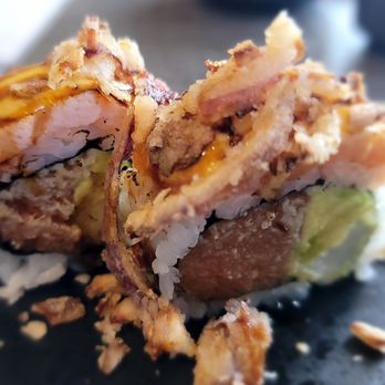 Yummy Sushi - The Long Weekend roll. Pretty tasty. Love that they added the fried onions on top.. they just put too much. - Sushi Bars Near Me - Coronado, California Yummy Sushi - The Long Weekend roll. Pretty tasty. Love that they added the fried onions on top.. they just put too much. - Sushi Bars Near Me - Coronado, California