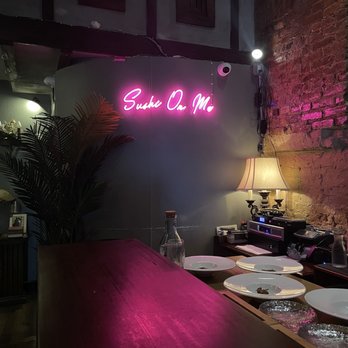 Sushi On Me - Williamsburg - a neon sign in the background - Sushi Bars Near Me - Brooklyn, New York