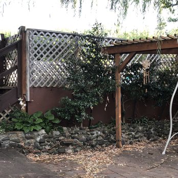 Beaver Tree Service - Before our rock wall and hostas, camellias, structures. - Tree Services Near Me - Central Point, Oregon