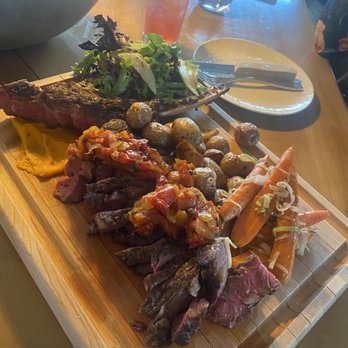 The Bison Restaurant - Tomahawk steak - Canadian (New) Near Me - Banff, Alberta The Bison Restaurant - Tomahawk steak - Canadian (New) Near Me - Banff, Alberta