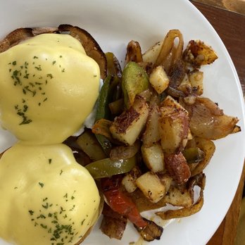 Hi Tulip Cafe - Traditional eggs Benedict with home fries with onions and - American Near Me - Flagler Beach, Florida Hi Tulip Cafe - Traditional eggs Benedict with home fries with onions and - American Near Me - Flagler Beach, Florida