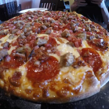 Mountain Dick's Pizza - Meat Lovers Pizza with extra sauce ($18.50) - Pizza Near Me - Jay, Vermont