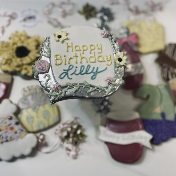 OCD Bakeshop - a birthday cake surrounded by cookies - Desserts Near Me - Mastic, New York