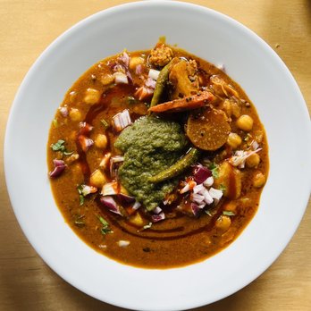 Indian Accent - a bowl of soup with vegetables - Indian Near Me - Calgary, Alberta Indian Accent - a bowl of soup with vegetables - Indian Near Me - Calgary, Alberta