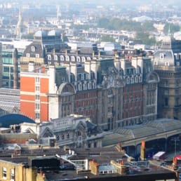 Victoria Station. From the left, you can see: an arch of the 1862 London, Dover and Chatham Railway; the South Eastern and