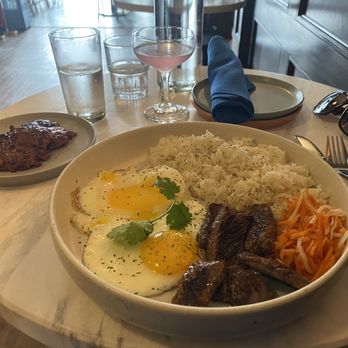 Maypole - Filipino breakfast with bistek on main plate and side of longanisa, so good! - New American Near Me - Wheaton, Illinois Maypole - Filipino breakfast with bistek on main plate and side of longanisa, so good! - New American Near Me - Wheaton, Illinois