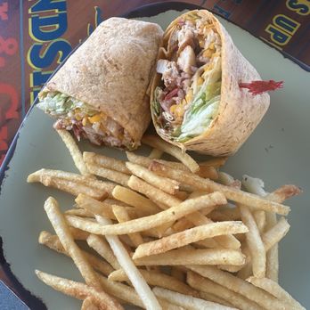 LandShark Bar & Grill - Jerk chicken wrap with fries - Burgers Near Me - Hollywood, Florida