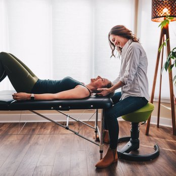 MovementX - Dr. Molly helping a patient alleviate neck pain with a hands-on technique called manual cervical traction. - Physical Therapy Near Me - Portland, Oregon MovementX - Dr. Molly helping a patient alleviate neck pain with a hands-on technique called manual cervical traction. - Physical Therapy Near Me - Portland, Oregon