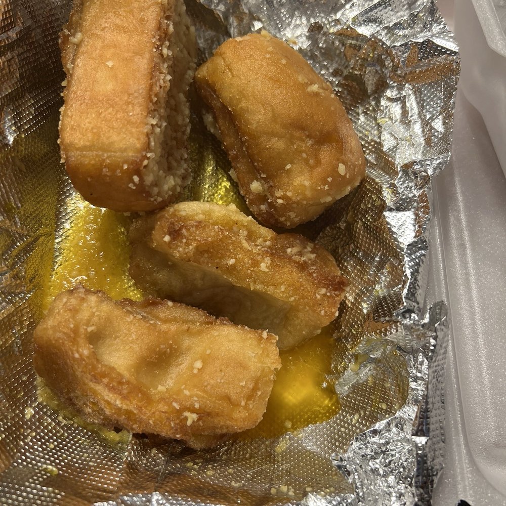 Imo’s Pizza - Bread bites that we got. How is that the same thing? Do you see all of the oil / butter / grease in the bottom? Heart attack anyone?? - Pizza Near Me - Troy, Illinois Imo’s Pizza - Bread bites that we got. How is that the same thing? Do you see all of the oil / butter / grease in the bottom? Heart attack anyone?? - Pizza Near Me - Troy, Illinois