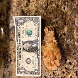 Chicken Express - Chicken Express leg with a dollar bill for comparison. I have seen bigger wings! What a rip off!
