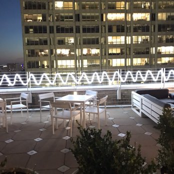Z on 23 Rooftop - When the sun goes down they turn on the festive lights and now it is a real party here on 23. This is looking west - Cocktail Bars Near Me - Houston, Texas Z on 23 Rooftop - When the sun goes down they turn on the festive lights and now it is a real party here on 23. This is looking west - Cocktail Bars Near Me - Houston, Texas