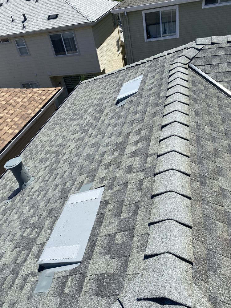 Slide of Tip Top Roofing