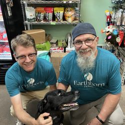 Feeds Plus - Our new senior rescue lab hound mix, flanked by teo-legged friends. If your dog is hyper Social in those big pet stores try this.