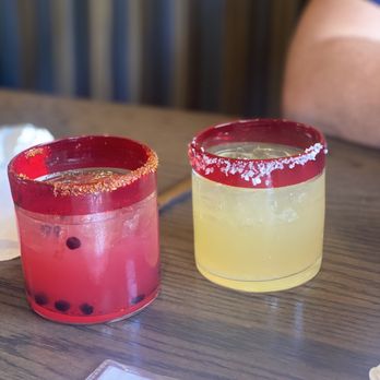Merry Piglets Mexican Grill - Huckleberry spicy margarita with tajin rim, top shelf margarita with teremana tequila - Mexican Near Me - Jackson, Wyoming