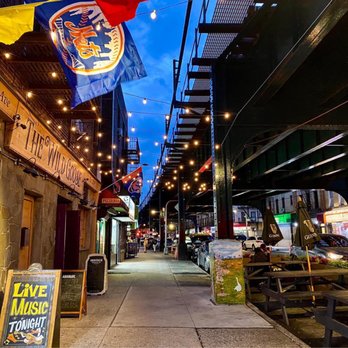 The Wild Goose - a city street at night - Sports Bars Near Me - Woodside, New York The Wild Goose - a city street at night - Sports Bars Near Me - Woodside, New York