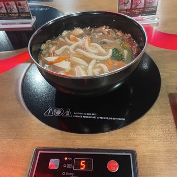Dragon Tiger Noodle Co. - Burner heating bowl - Noodles Near Me - Central City, Colorado