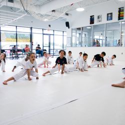 Karate International - Stretching at the beginning of class