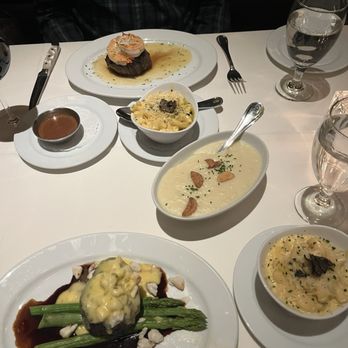 Ocean Prime - Filet Oscar style and filet shrimp scampi. Truffle Mac and cheese, whipped potatoes. Side of au poivre sauce. - Seafood Near Me - Chicago, Illinois