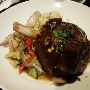 Foxhole Culinary Tavern - Lamb shank and herb potatoes! - New American Near Me - Austin, Texas Foxhole Culinary Tavern - Lamb shank and herb potatoes! - New American Near Me - Austin, Texas