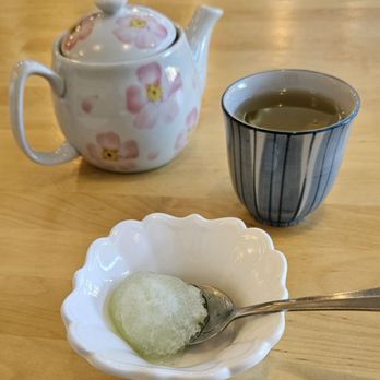 Ari Sushi - Icy spoonful of super sweet yuzu shaved ice with pot of green tea - Sushi Bars Near Me - Dublin, California