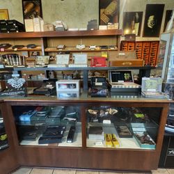 Havana Connections - The display counter pipes and misc merchandise