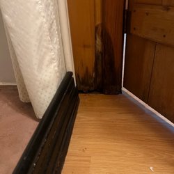 Double RR Ranch Resort & Golf - Wood damage and hole in bathroom (where mice escaped to)