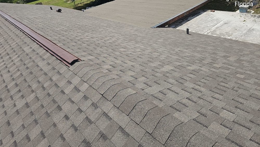 Slide of EBS Roofing