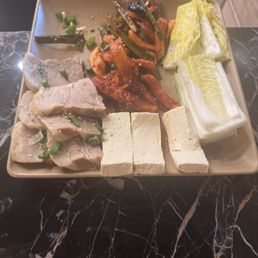 Half eaten small pork bossam Half eaten small pork bossam
