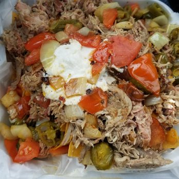 Boarhog's Barbeque - Loaded Pork Nachos. BBQ sauce & white sauce ots. Shareable but I ain't sharing. - American Near Me - Huntsville, Alabama Boarhog's Barbeque - Loaded Pork Nachos. BBQ sauce & white sauce ots. Shareable but I ain't sharing. - American Near Me - Huntsville, Alabama