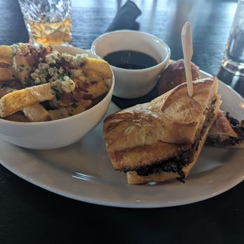 The James Kitchen and Bar - Prime Rib French dip sandwich with the "james" style fries and aujus. - Whiskey Bars Near Me - Boise, Idaho The James Kitchen and Bar - Prime Rib French dip sandwich with the "james" style fries and aujus. - Whiskey Bars Near Me - Boise, Idaho