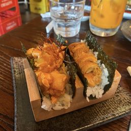 Uni hand roll and salmon(cooked?!)  hand roll