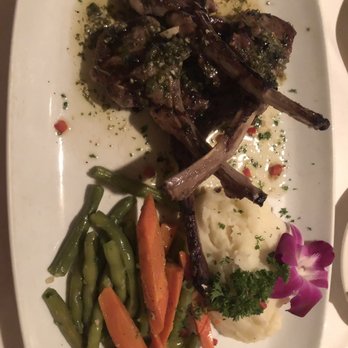 Tavira Restaurant - Rack of lamb with mashed potatoes and veggies - Mediterranean Near Me - Chevy Chase, Maryland