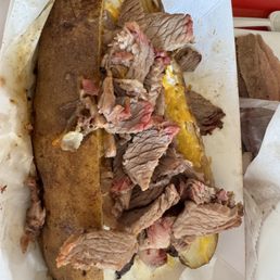 Brisket over baked potato