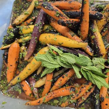 Renaissance Catering - A close-up of rainbow carrots, seasoned to perfection--crisp, tender, and slightly sweet. - Party & Event Planning Near Me - Las Vegas, Nevada