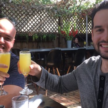 Hullabaloo - They're getting started on their bottomless mimosas! - Gastropubs Near Me - West Palm Beach, Florida Hullabaloo - They're getting started on their bottomless mimosas! - Gastropubs Near Me - West Palm Beach, Florida